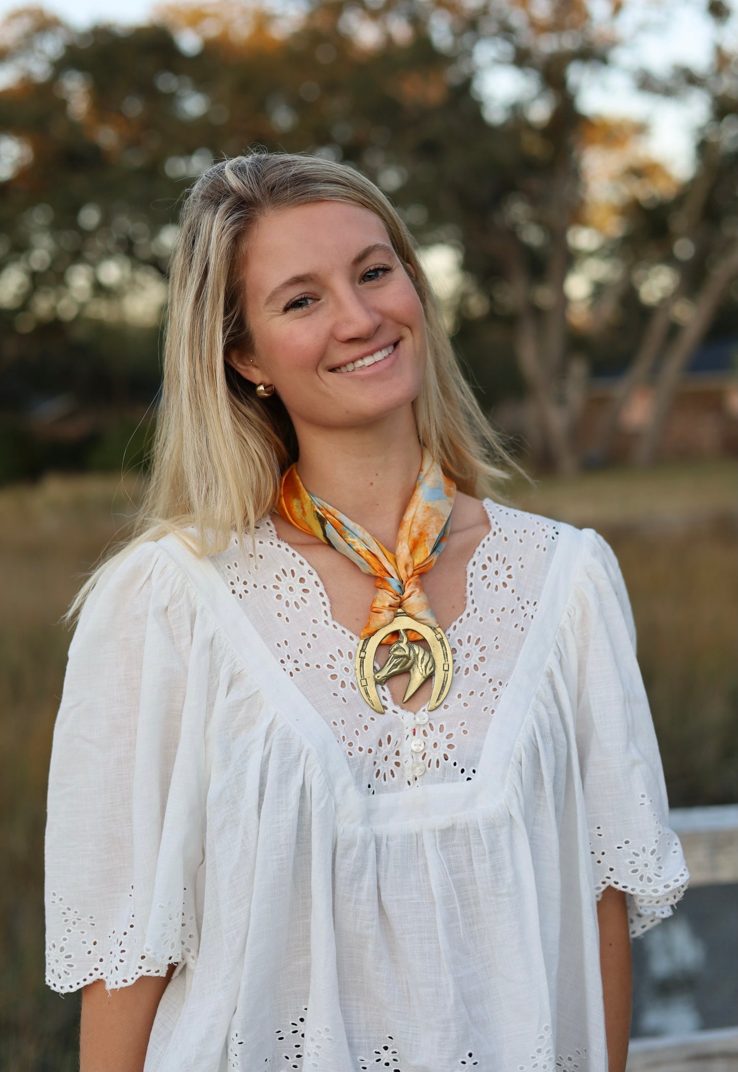 Brass Horse Medallion With Orange Faux Silk Scarf